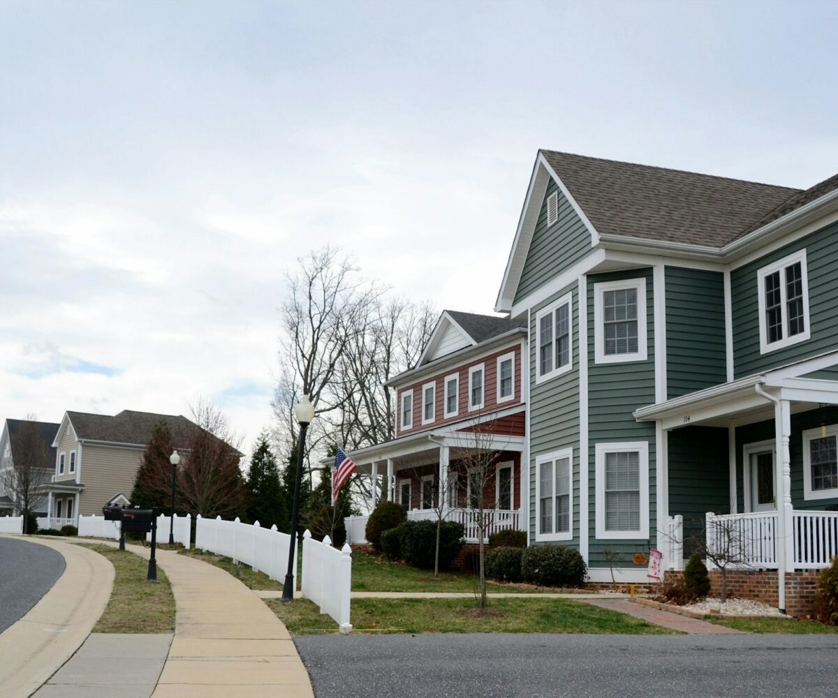 A street of modern homes houses in various colors to make a cozy neighborhood of prime real estate